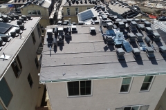 aerial view of multiple rooftops ready for installation of finish material